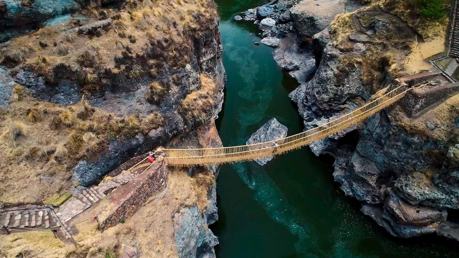 Qeswachaka Inca Bridge - Traditional bridge renewal craftsmanship in Canas
